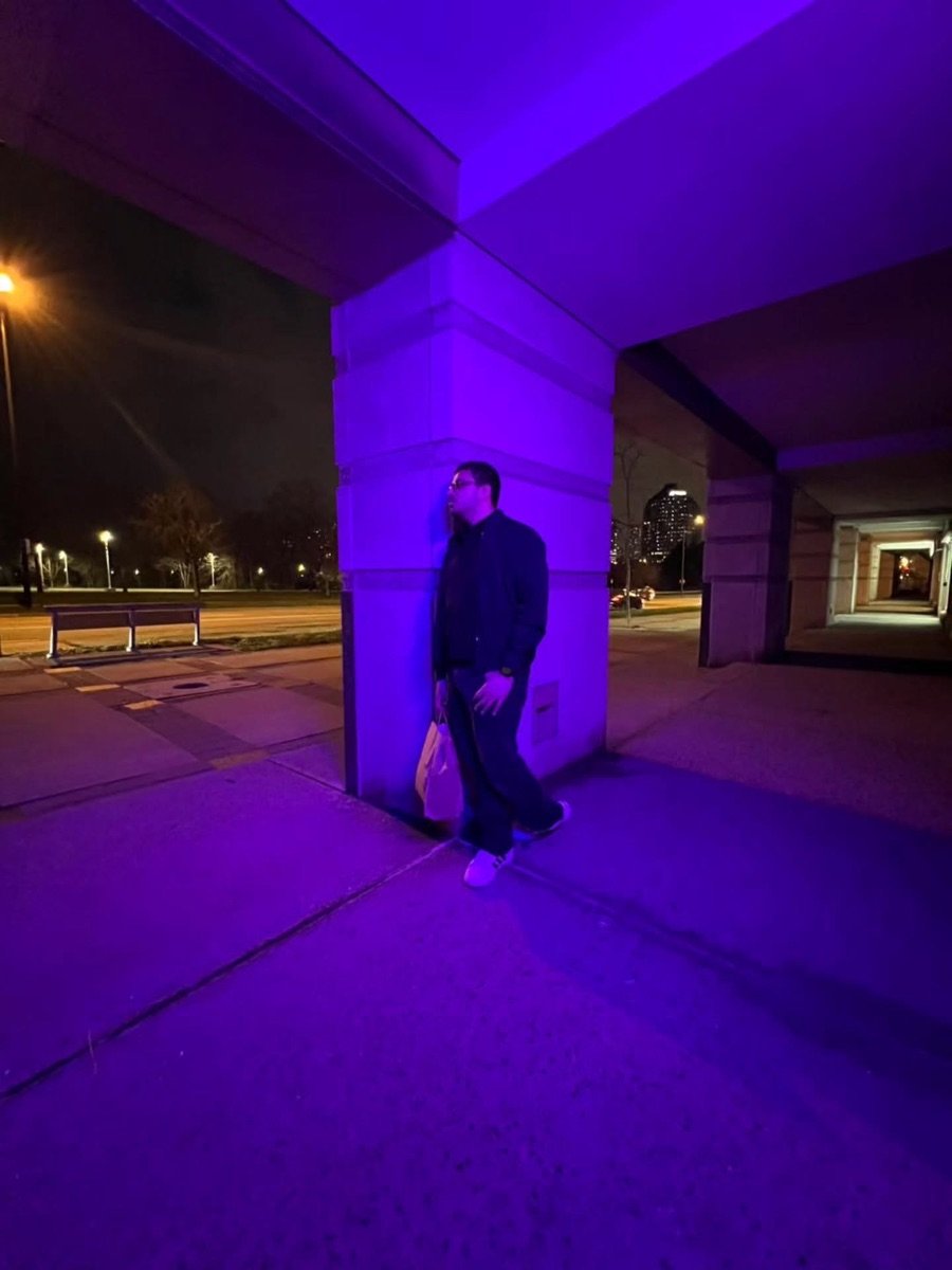Mustafa out in the city at night