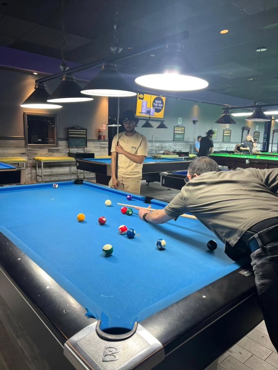Mustafa at the pool hall
